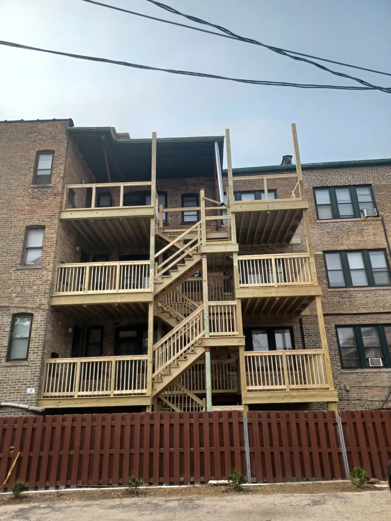 A well-designed multi-level porch offering expansive views, created by porch builders